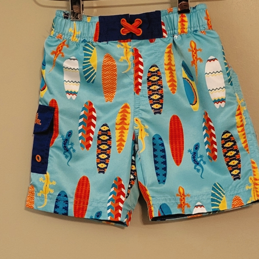 UV Skinz colorful surfboard print swim trunks